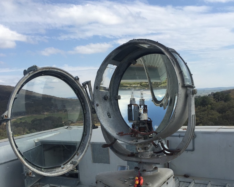 Goulburn's Rocky Hill War Memorial searchlight being repaired.