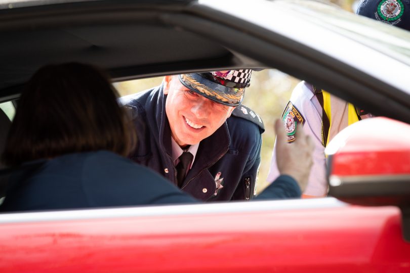 Police welcoming the residents home