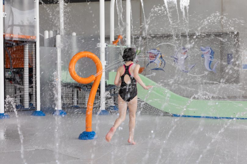 young girl playing at an aquatic centre