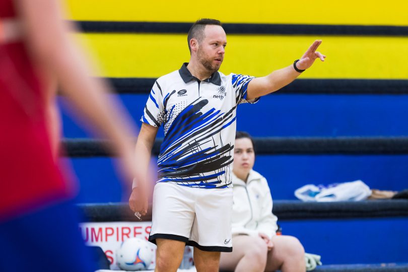 Trent Rawlings umpiring netball game in HCF State League.