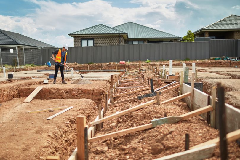 Worker on residential building site.