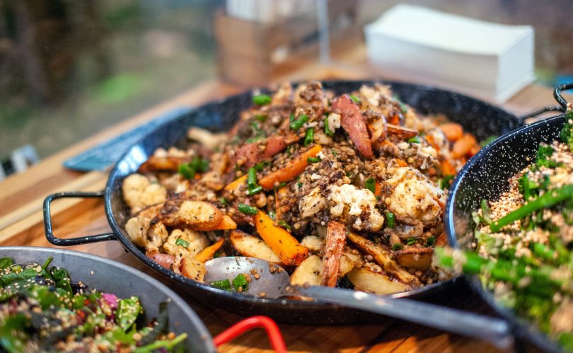 Roasted veggies tossed with toasted seeds and lentils