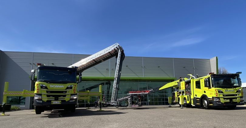 Two new ACT Fire and Rescue trucks parked.