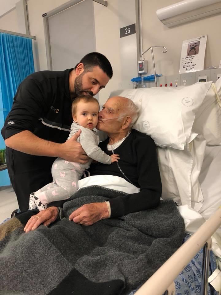 Michael Caggiano with his baby daughter and Antonio Fischetti