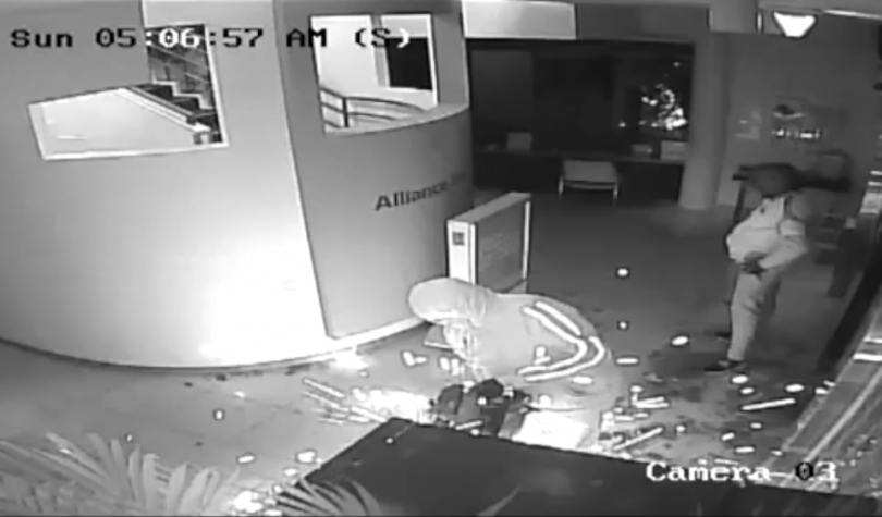 Thieves with an angle grinder during a burglary on 13 September