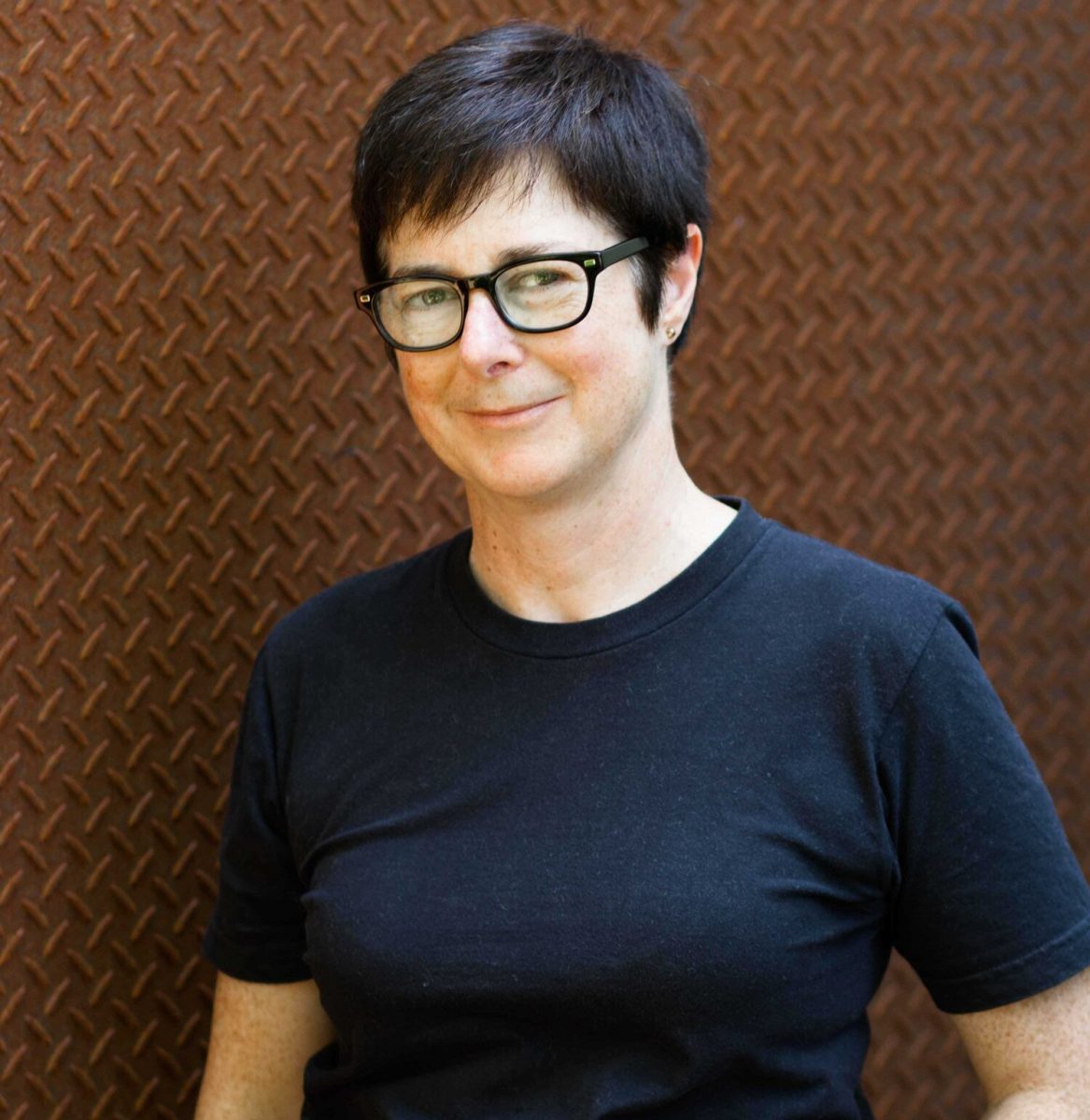 woman with black t-shirt and glasses