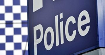 Police seek man in black after Mawson robbery