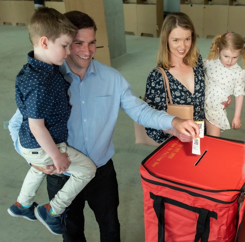 Alistair Coe voting with his family