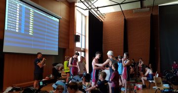 Mums move off the sideline and into the action at the Australian Indoor Rowing Championships