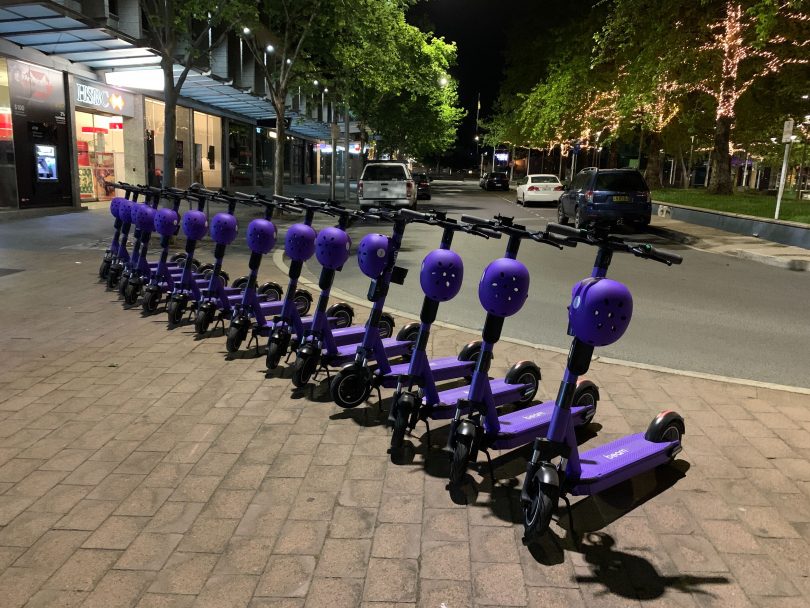 Beam e-scooters lined up in Canberra city.