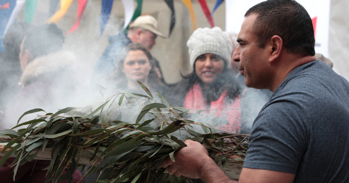 Richie Allan conducting smoking ceremony.