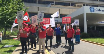 CORRECTED: Hospital cleaners picket over 