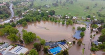 Heavy rain brings floods across southern NSW, dangerous seas along the coast