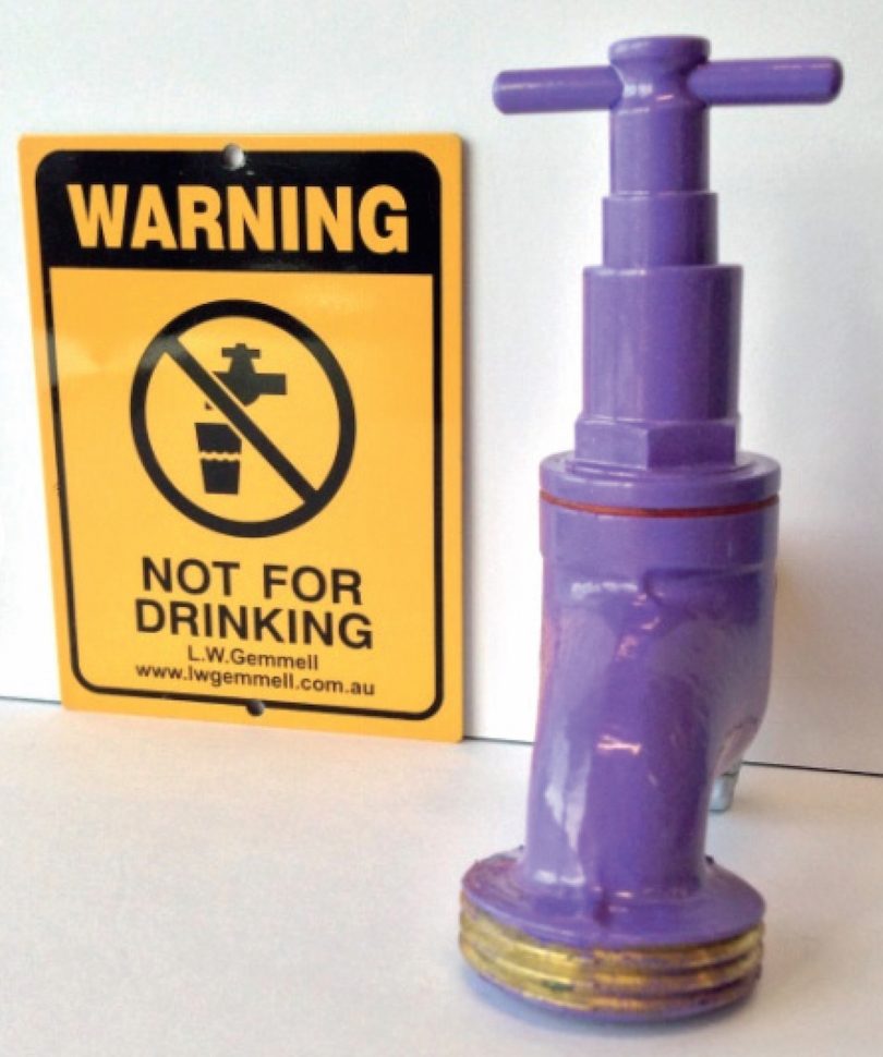 Purple tap and recycled water warning sign in Googong.