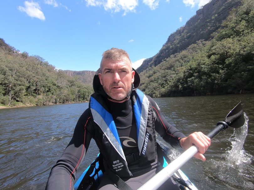 Andrew Oberg kayaking on Shoalhaven River.