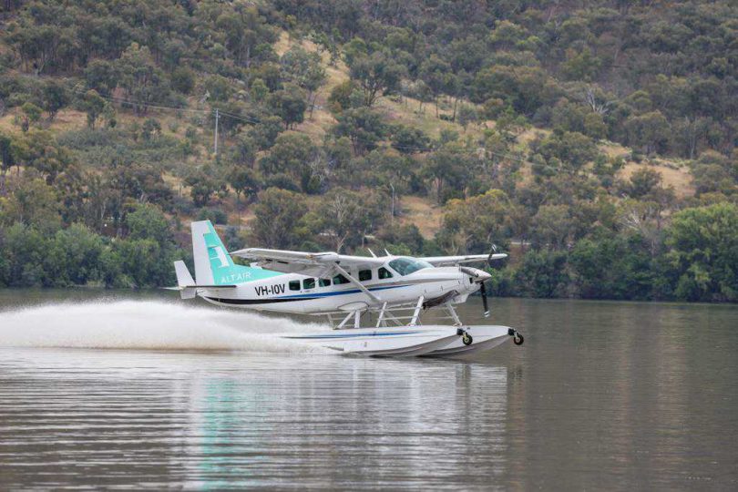 seaplane landing on lake
