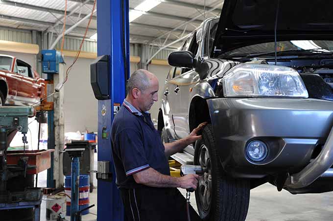 Mechanic at Rusden Europro Automotive doing a vehicle safety check.