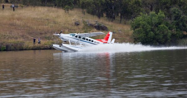 Lake first as seaplane demonstration flight splashes down in Canberra