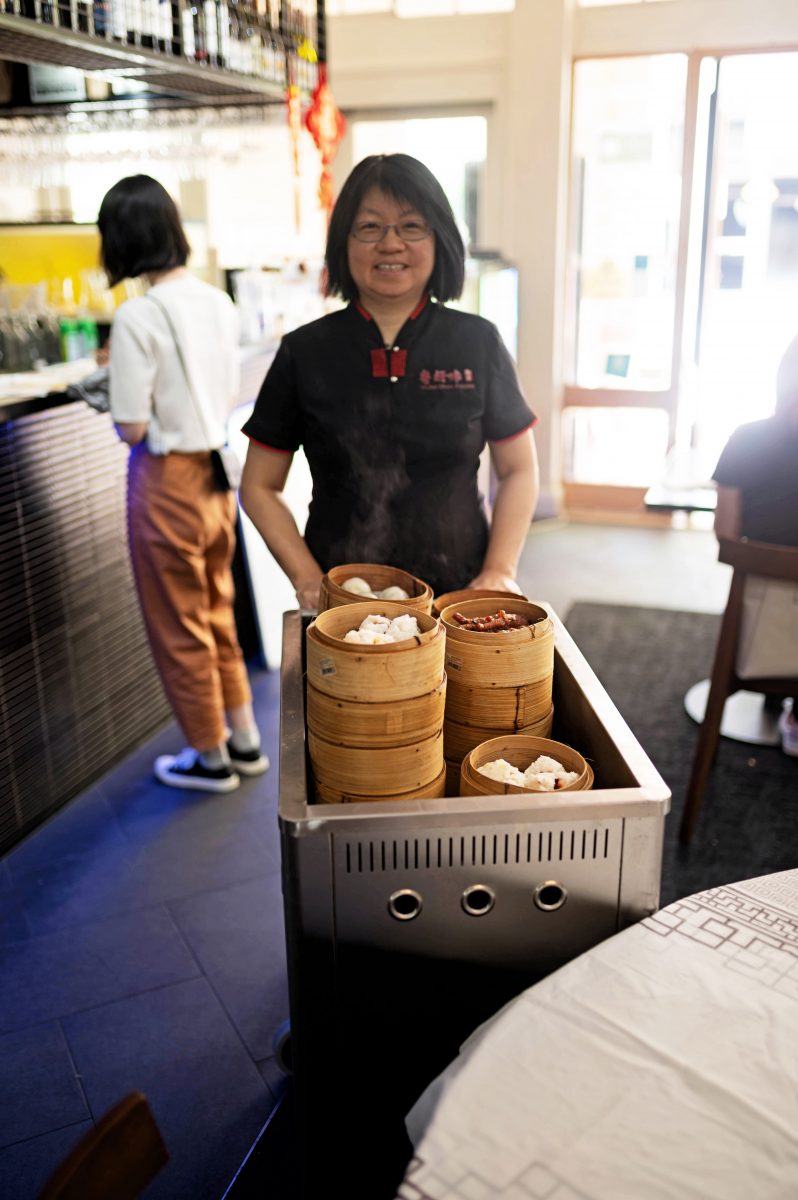 Carol wields a yum cha trolley