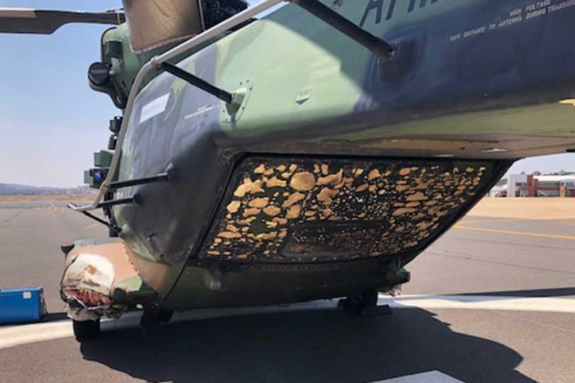 Fire damage to underside of Defence helicopter.