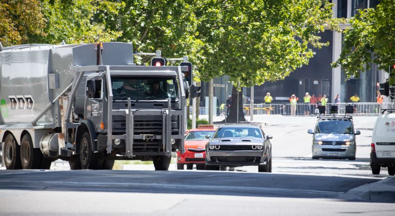 Car and truck on Canberra roads