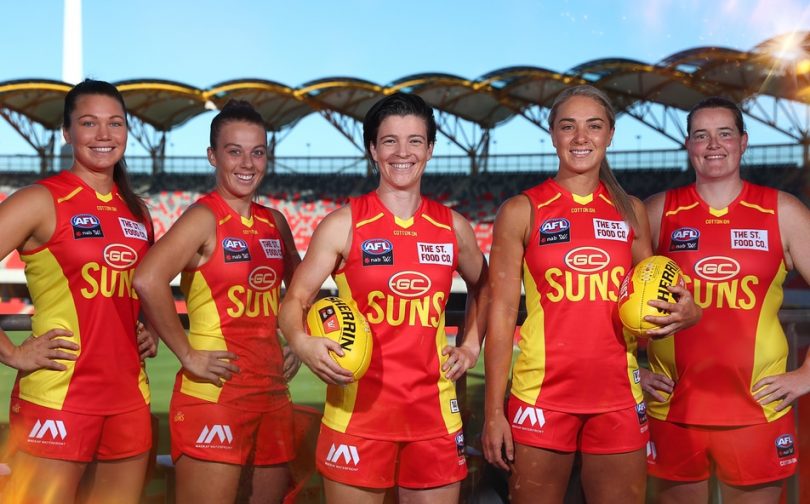 Hannah Dunn with Gold Coast Suns' AFLW team's leadership group.