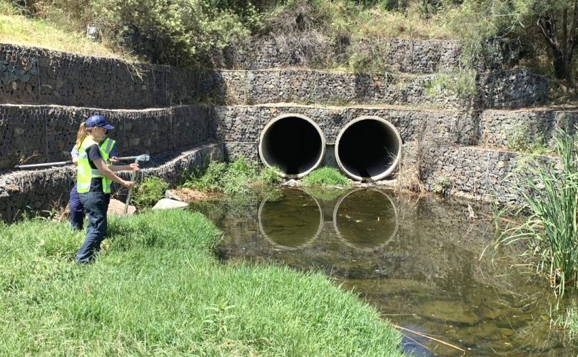 Water sampling at the Molonglo River