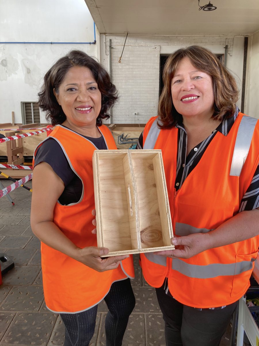 Women's Shed president Sunita Kotnalda and vice-president Robby McGarvey show off their handiwork.