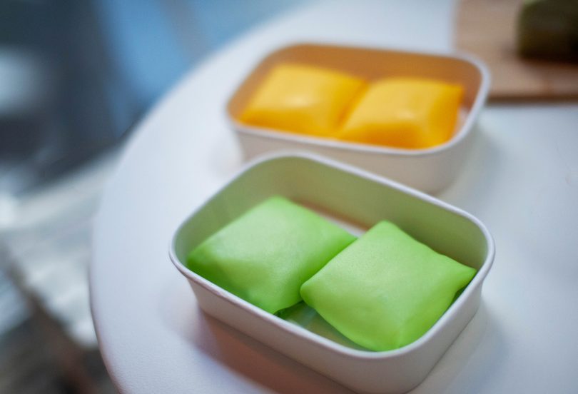 Bright green durian pancakes and sunset-hued mango pancakes