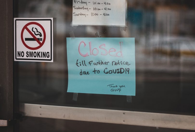 'Closed' sign on shop window