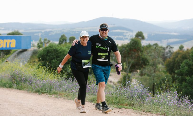 two people walking in fun run