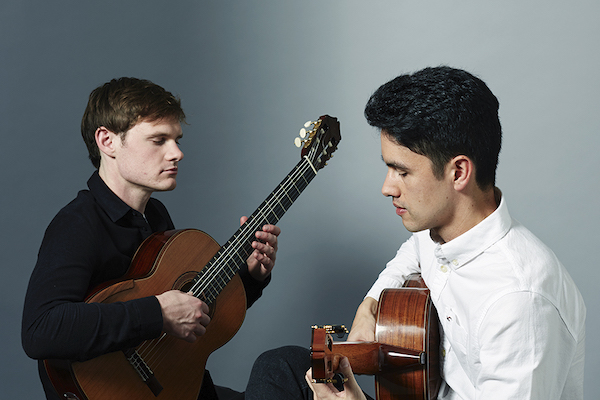 Andrew Blanch and Ariel Nurhadi playing guitars