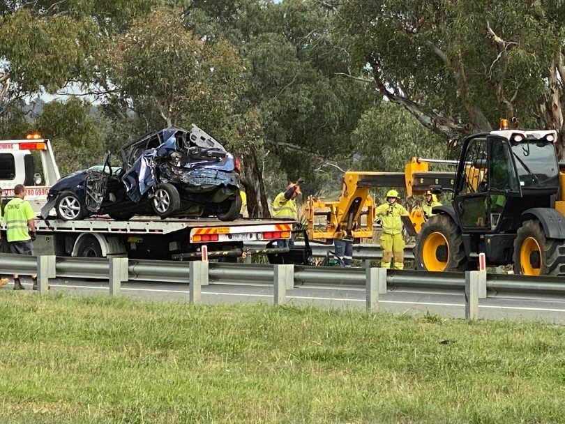 Vehicle rolls over in three-car crash in Sutton