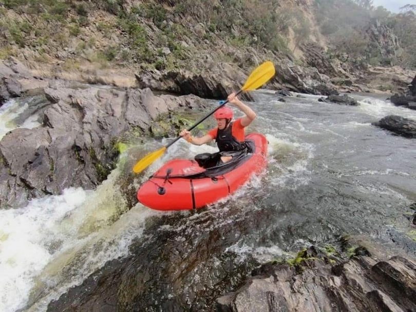 Michael Beard packrafting on Shoalhaven River.