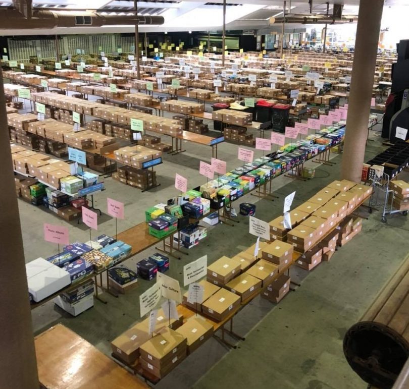 Tables of boxes at Lifeline Bookfair.