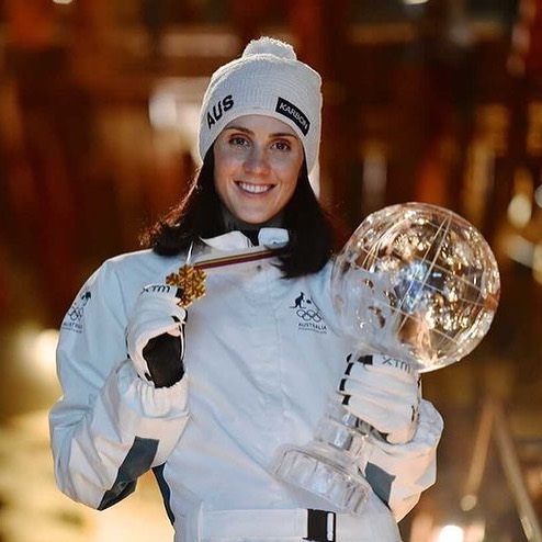 Laura Peel holding medal and trophy