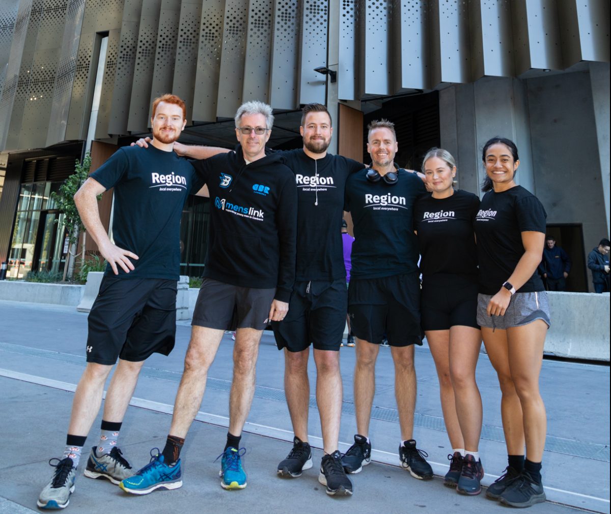 Six people in front of High Society building in Belconnen