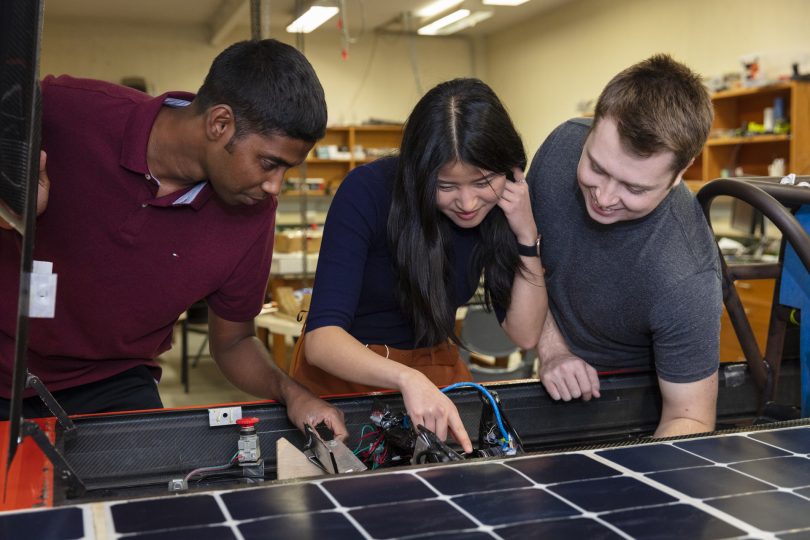 Christopher Joseph, Nicole Wang and Henry Skelly working on ANU Solar Racing project