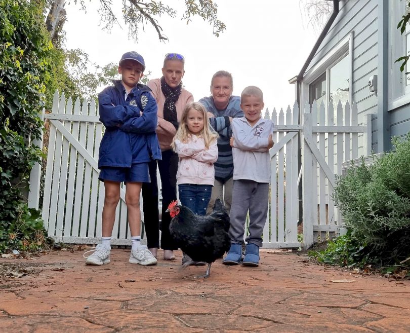 Callum Street residents with chicken