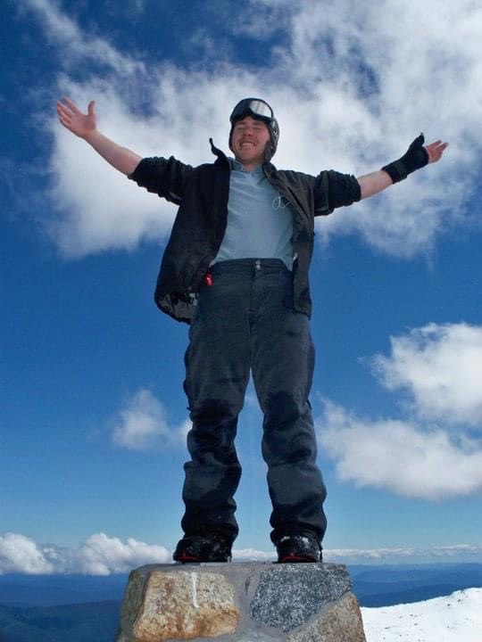 Andrew Drake on top of Mount Kosciusko