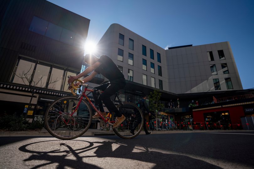 Cyclist on the Australian National University's Acton campus