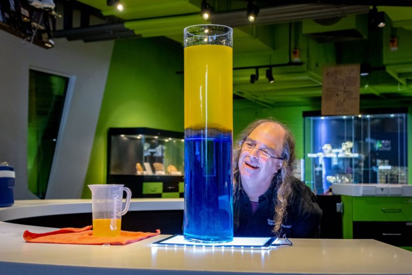 Man conducting water science experiment at Questacon in Canberra