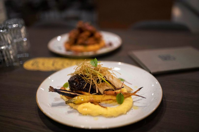 Red wine-braised beef cheek on polenta