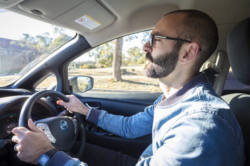 David Haynes driving Nissan Leaf electric vehicle