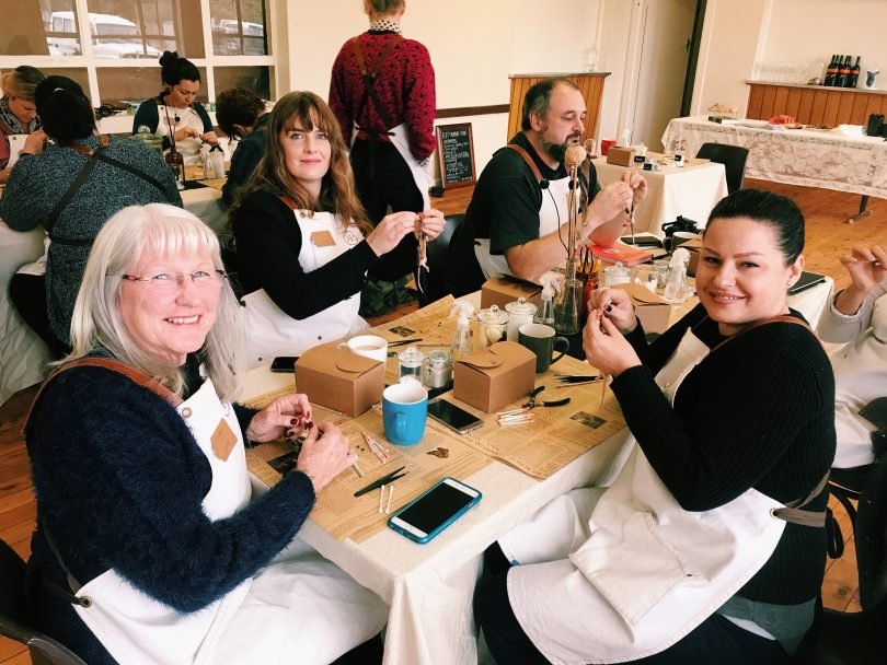 Participants sitting at table in Wired Open Labs arts workshop