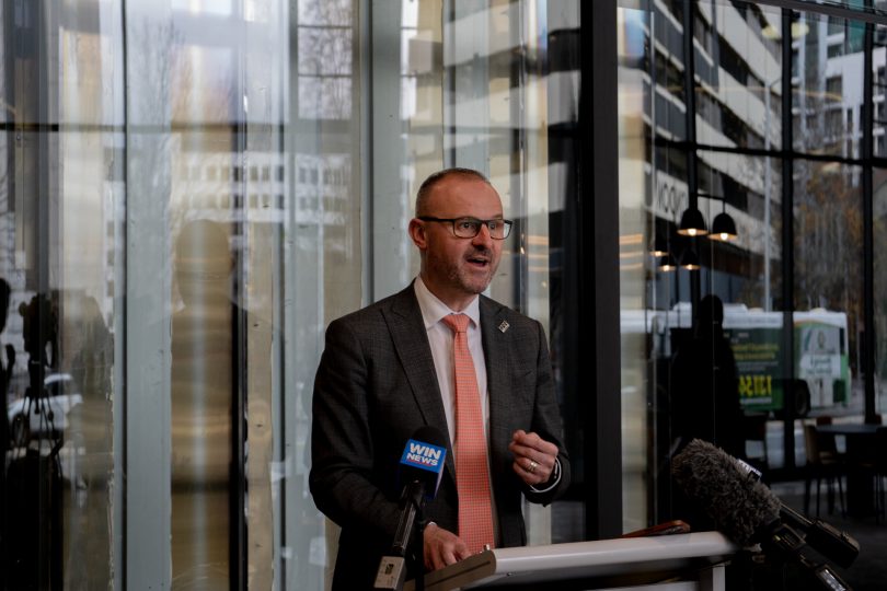 Andrew Barr standing at a lectern