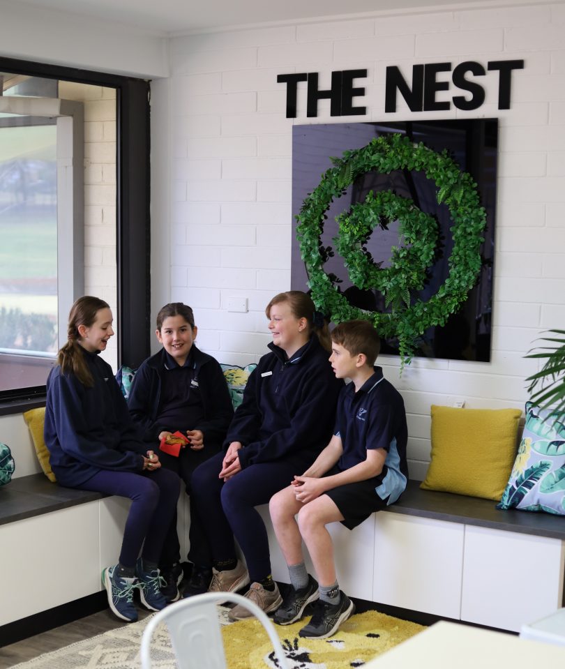 Four students sitting in The Nest cafe at Evatt Primary School