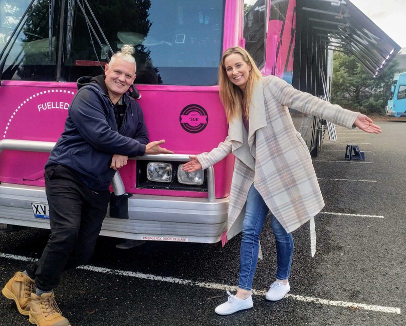 Simon Rowe and Juanita Flett with the Canberra pink sleepbus