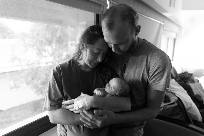 Tory Bridges and Harry Townsend with newborn baby, Finley River