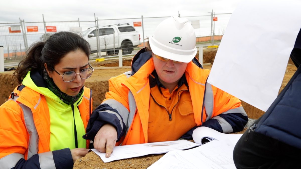 women working on a job site